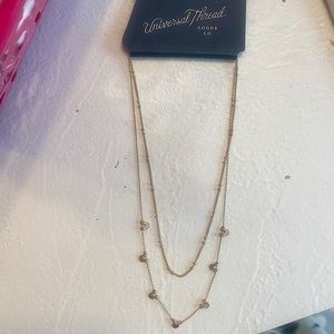 This Universal Thread’s necklace is gold.